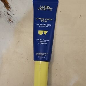 Ultra Violette Supreme Screen SPF 50 in Blue and Yellow